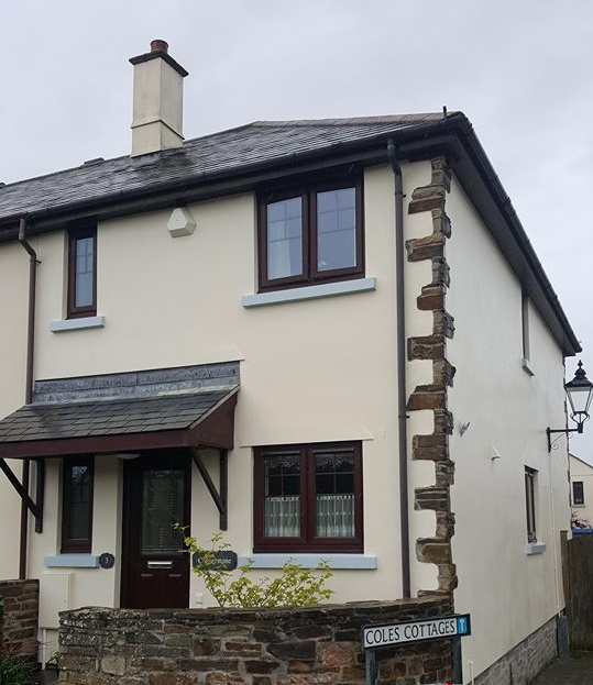 external painting on cottage.