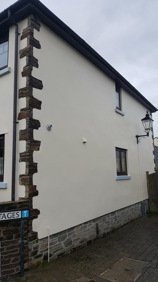 external painting on cottage.